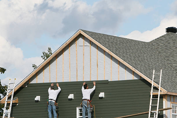 Professional Vinyl Siding technician working in Maple, NC